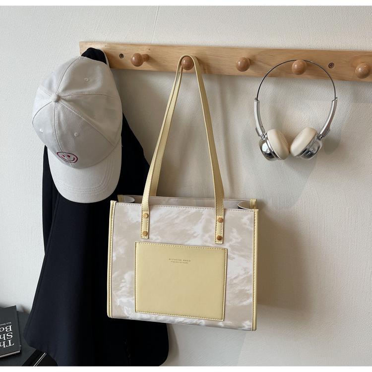 

Popular high-end sense large-capacity underarm tote bag women s bag 2025 new summer splicing simple shoulder commuter bag