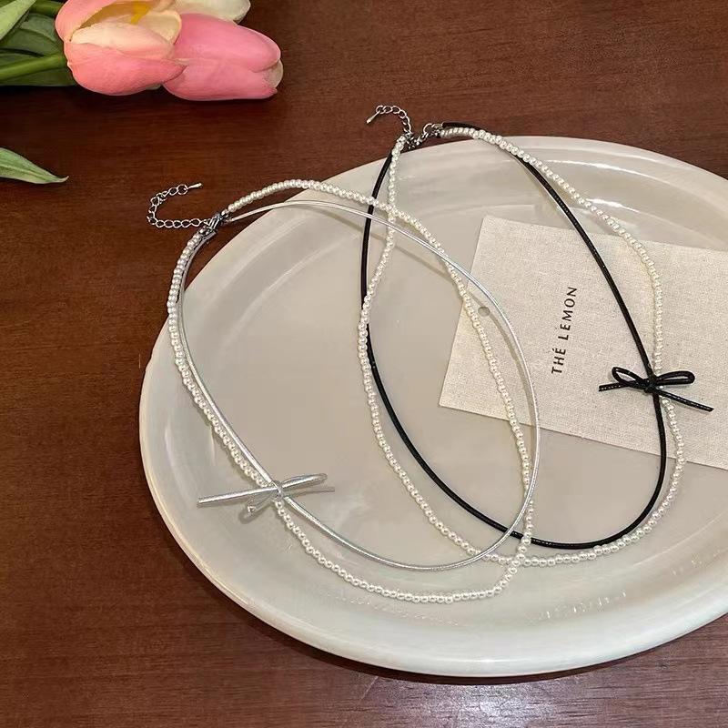 Double bow pearl necklace female design sense Spice girl sweet cool wind neck chain new choker leather rope with jewelry