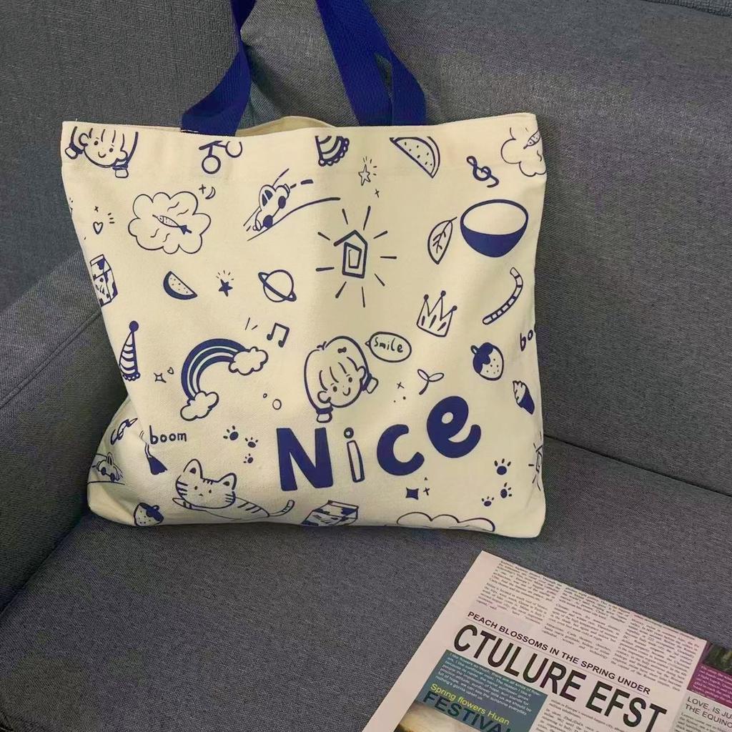 Koreanische Version der Stofftasche für weibliche College-Studenten, niedliche Umhängetasche für den Unterricht, große Kapazität, Tragetasche, Rucksack aus Graffiti-Canvas