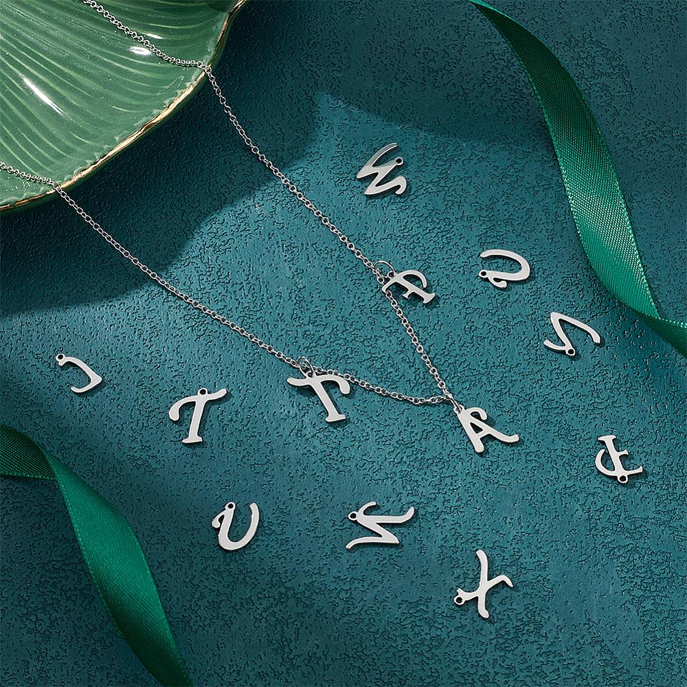 2 Sets 201 Stainless Steel Charms Alphabet Stainless Steel Color Laser Cut Letter A~Z 10~13x6~14x1mm Hole: 1mm 26pcs/set