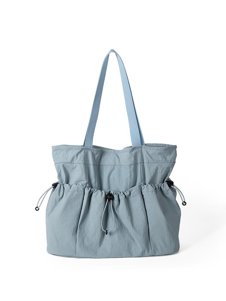 

New Korean Style Minimalist Casual Shoulder Bag for Women with Large Capacity and Niche Design, Pleated Commuting Nylon Tote Bag синій