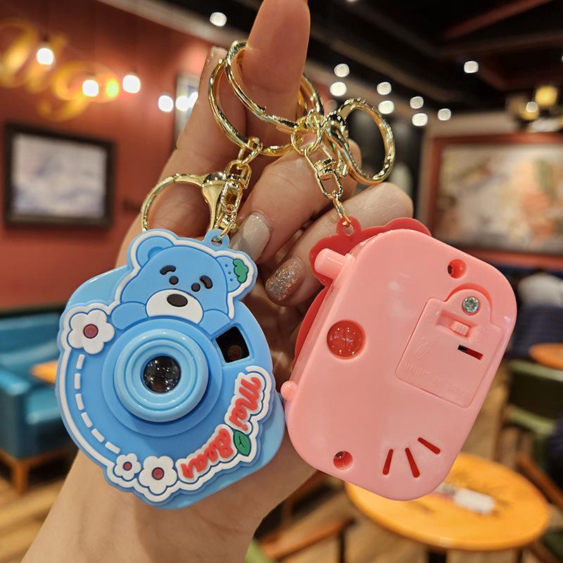 Niedliche Mini-Projektionskamera Cartoon Leuchtendes Projektionslicht Damenhandtasche Schlüsselanhänger Anhänger