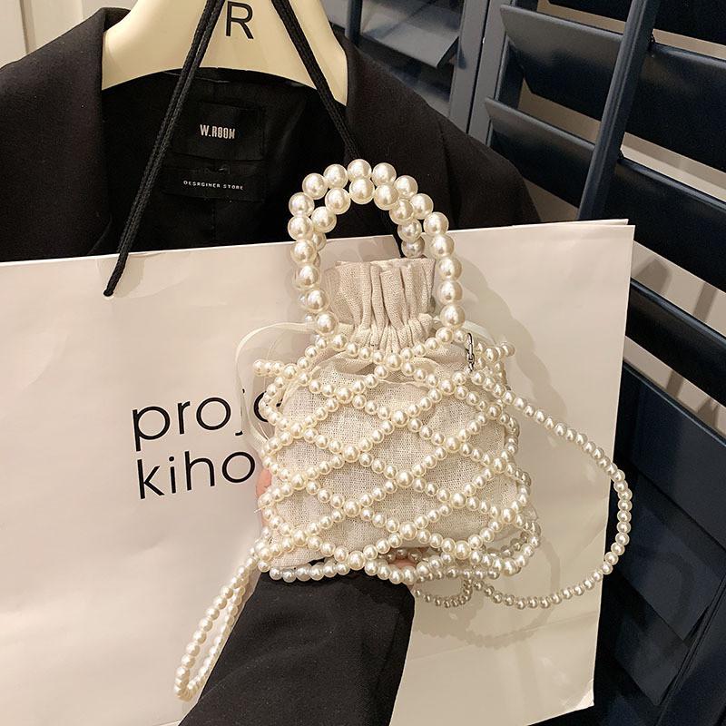 

Cute Vintage Handbag For Kids Fashionable Woven Pearl Crossbody Bag For Girls Vertical Net Bag