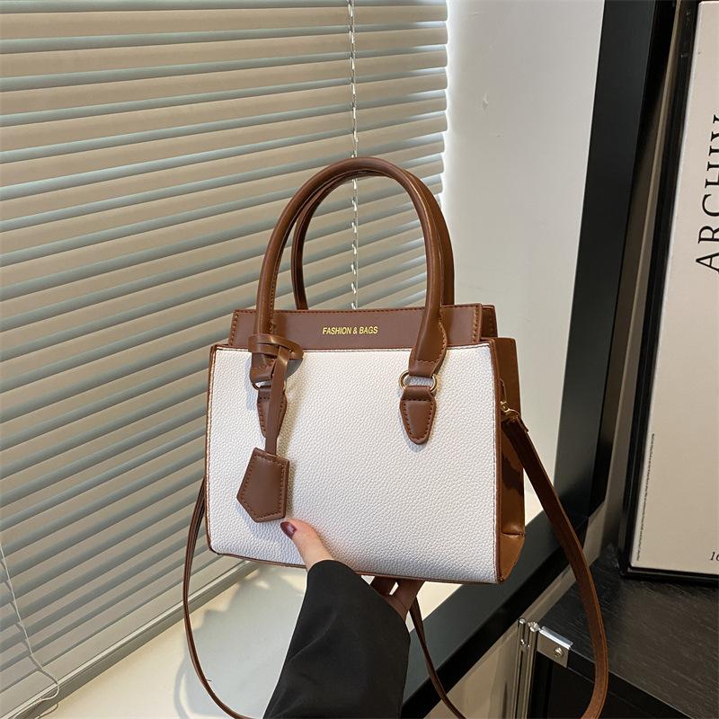New beautiful contrasting color design sense niche atmosphere high texture women's handbag versatile shoulder messenger bag
