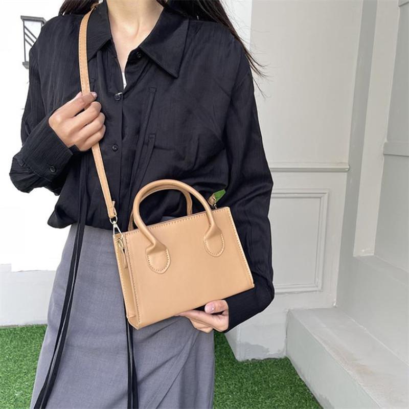 Trendige quadratische Handtasche für Damen, einfache Mini-Umhängetasche, minimalistische Oberhenkeltasche, einfarbige Geldbörse, Designertasche