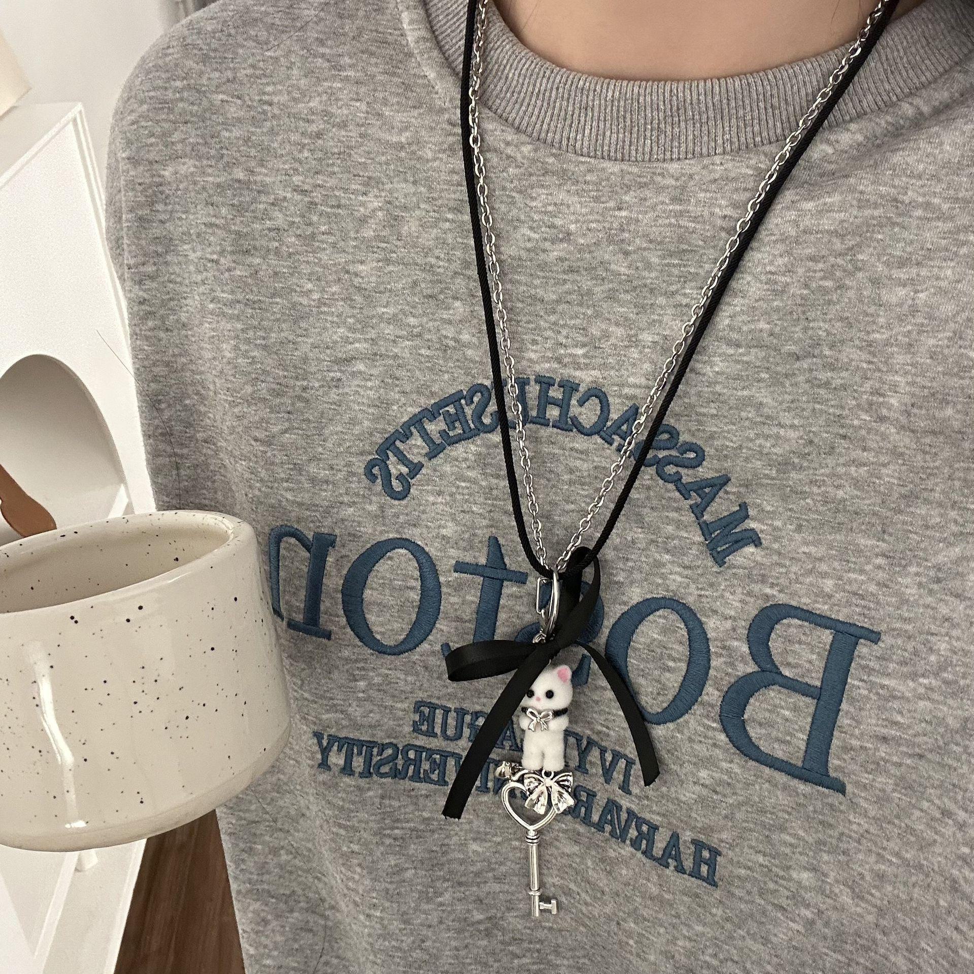 

Ожерелье с кулоном в виде кота в форме сердца и банта - милый мультяшный аксессуар для девочек, модный и стильный N1141 белый