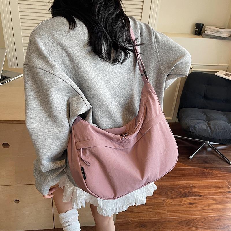 Fashion commuter dumpling bag women's shoulder bag summer new casual versatile small breast bag messenger bag