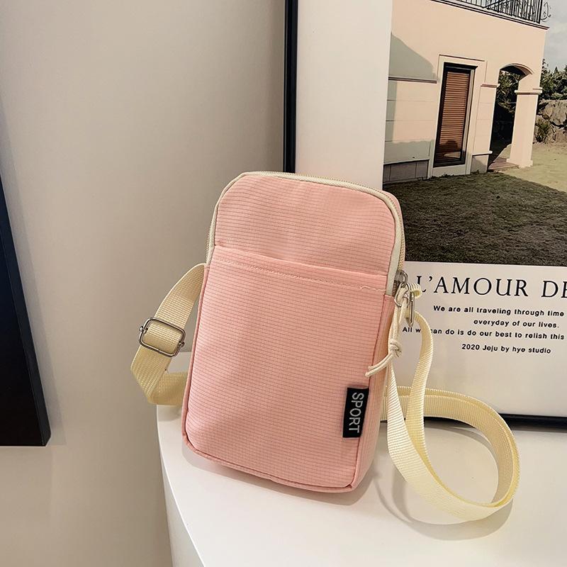 Multi-color mobile phone bag, large-capacity shoulder bag, simple and fashionable messenger bag, solid color change bag, nylon small backpack.