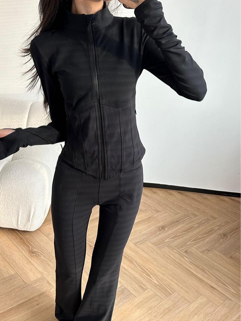 ALO Yoga Schlank geschnittene Langarm-Radjacke mit Stehkragen und Taillenraffung