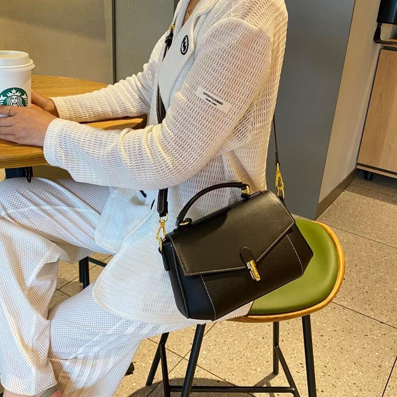 Fashion Commuting Versatile Hand held Crossbody Bag with Cowhide Temperament  Leather Shoulder Straps  Genuine Leather Women's Bag