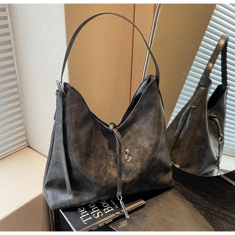 Retro high-end sense fashion large-capacity bag women's new versatile wasteland wind tote bag shoulder bag