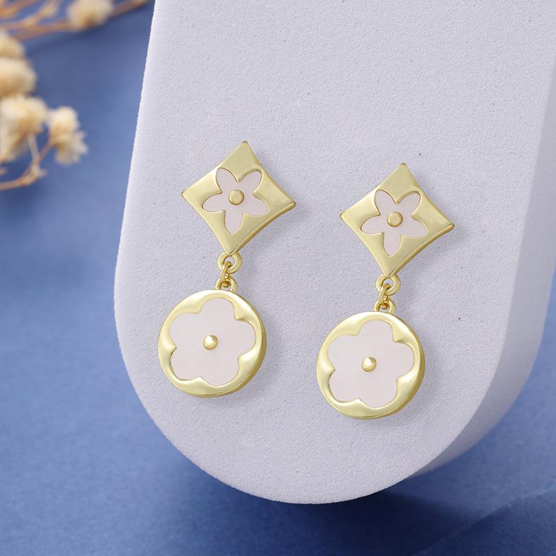 

Горячая Распродажа Серьги-капли Счастливая женщина с цветком из пяти лепестков Высококачественные серьги Цветок сливы Классические для вечеринки Бренд Циркон Клевер белый