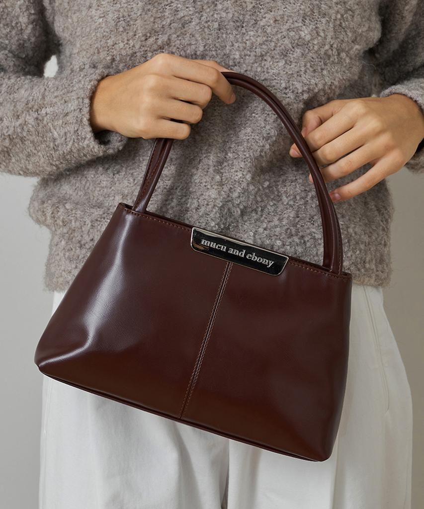 Mucu And Ebony Clam Bag _ Brick Brown