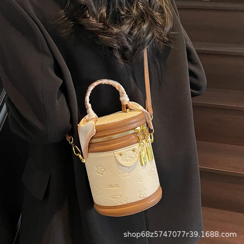 Hot-selling versatile high-end Korean version temperament portable bucket bag niche cute embossed women's messenger bag