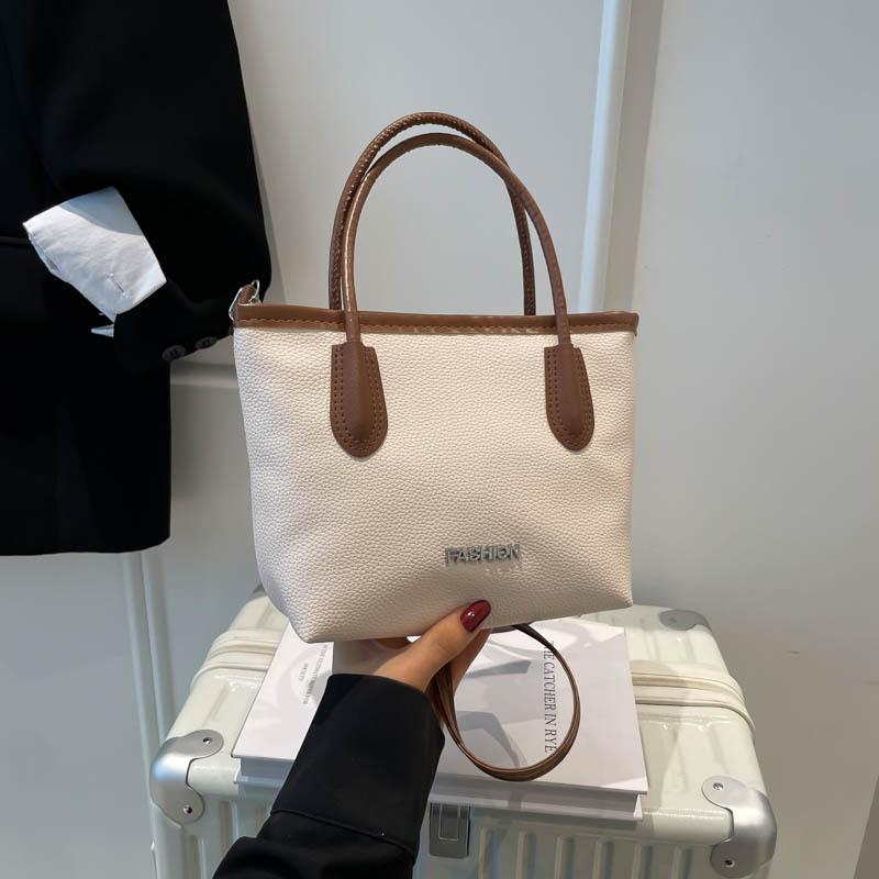 

Niche fashion bag women s high-value new versatile shoulder messenger bag commuting daily vegetable basket women s bag білий