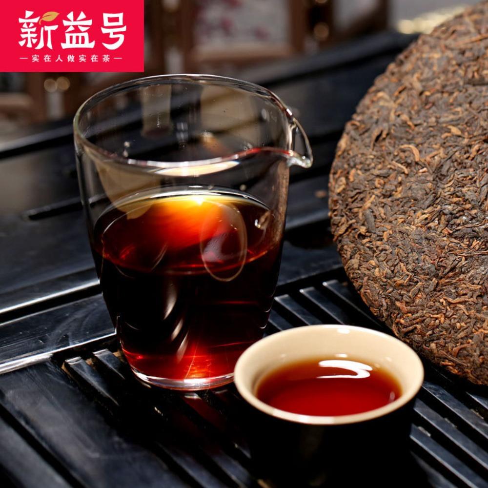 Menghai Yunnan Pu'er Reifer Tee Xinyihao Alter Baum Sieben Samen Kuchen 357g Tee