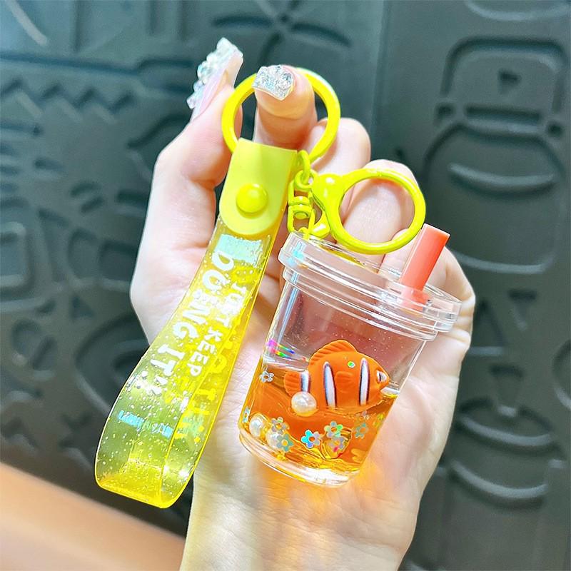 Exquisite Quicksand Panda Keychain: Cartoon Oil-Filled Doll Bag Pendant and Car Accessory