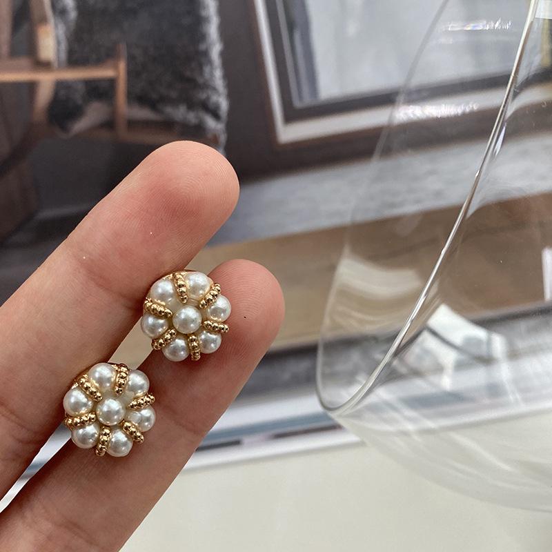 

Yisen ESSTUDIO Металлический цветок Перламутровая пуговица Женская модная блузка Украшение - Уникальный дизайн