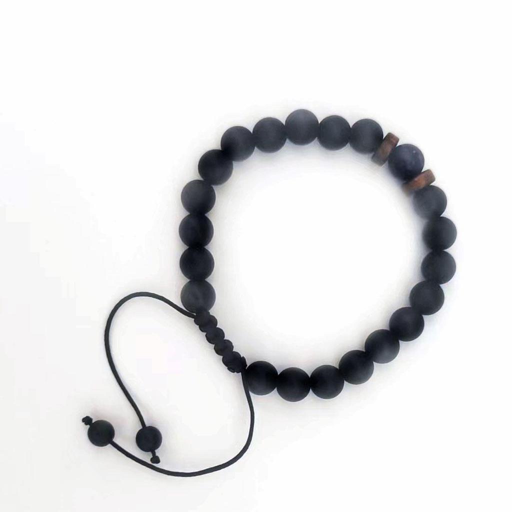 Armband aus schwarzem Lavastein und Holzperlen