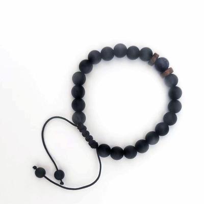 Armband aus schwarzem Lavastein und Holzperlen