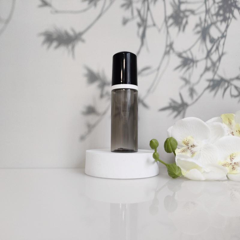 Available 60ml Transparent Black Foam Mousse Bottle for Face Wash and Travel-friendly Cosmetic Packaging.