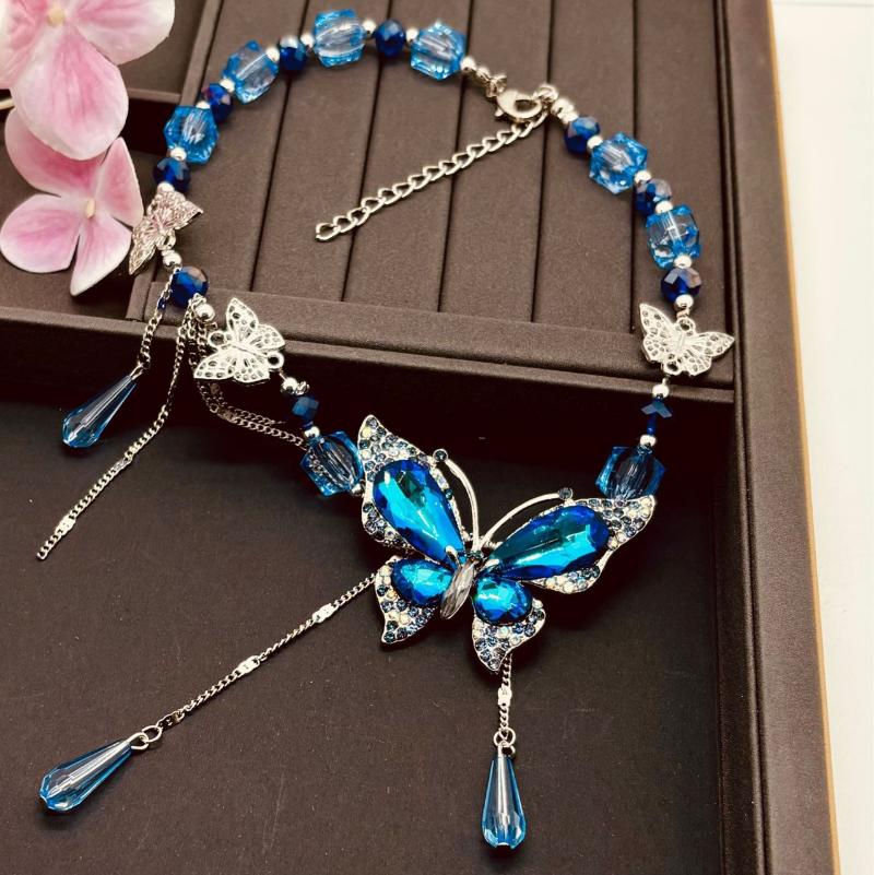 Náhrdelník na klíční kost s motýlem a kapkou vody Tmavě modrý Niche Retro Motýl Křišťálový Temperamentní Náhrdelník Špičkový Náhrdelník pro Ženy