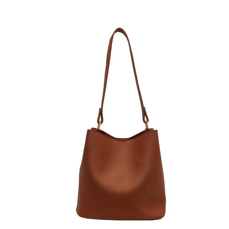 

The new high-end niche commuting bucket mother and child bag is now popular single shoulder messenger women s bag коричневый