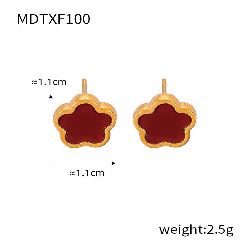

Браслет-цветок из титановой стали и комплект из серег с белыми ракушками