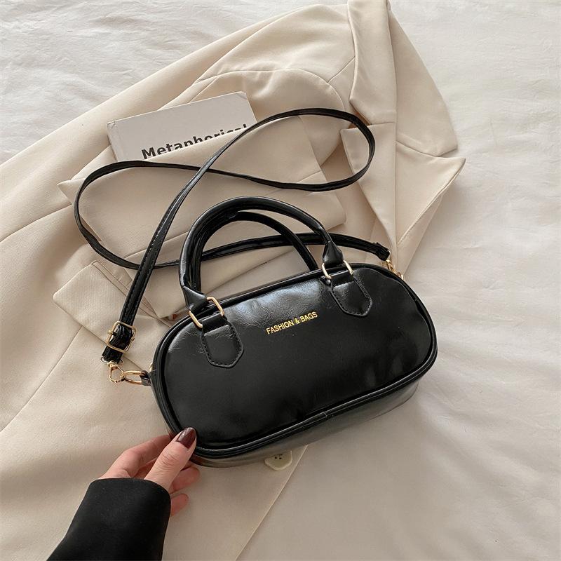 Portable New Bowling Bag Women's 2025 Spring and Summer New Korean Version Fashion Shoulder Bag Simple Casual High Texture