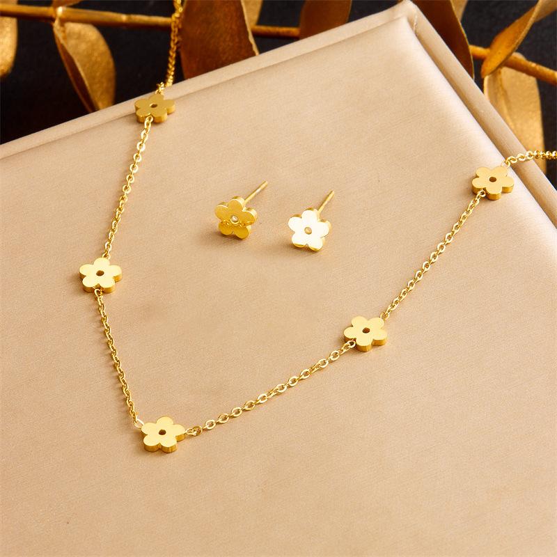 Gold Flower Charm Jewelry Set with Necklace Bracelet and Stud Earrings