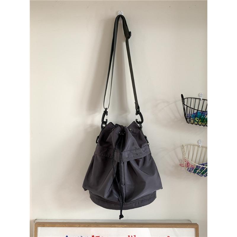 

Сумка Женская Сумка на шнурке Складная На плечо Кроссбоди Большая вместимость Повседневная Универсальная Легкая Портативная Нейлоновая Сумка-ведро Женская серый