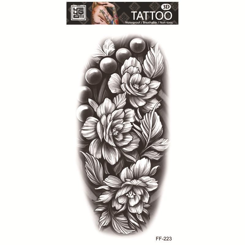 Vodotěsné tetovací samolepky: Totem vlčí hlavy a design s arabským textem.