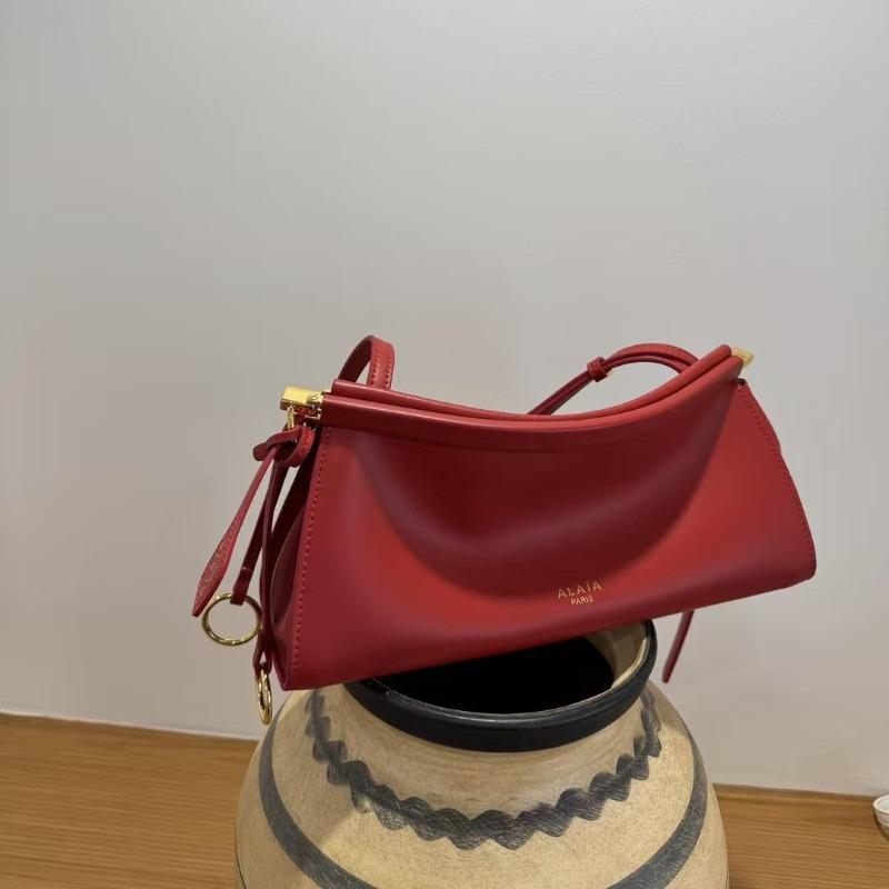 Französisches Nischendesign minimalistischer Stil Rindsleder Schulter Achseltasche Pendeln einfach Mode vielseitig Damenmode Baguette-Tasche