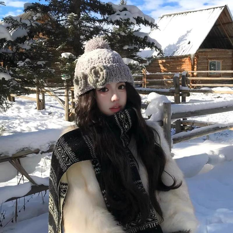 Korean atmosphere soft waxy coarse wool hat autumn and winter new crochet three-dimensional camellia knitted hat niche ear protection hat