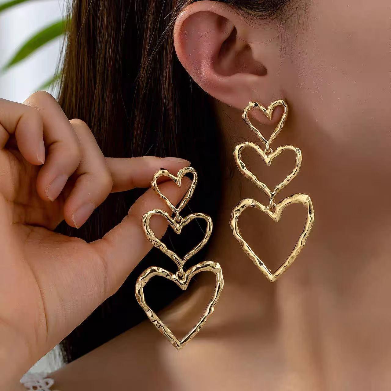 

Универсальные европейские и американские серьги-капли в форме сердца - Стройнящие, Необычный дизайн, Полая форма сердца