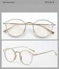 Unisex japanisch-inspirierte Titan-Schildpatt-Brille mit photochromem unregelmäßigem Leopardenmuster-Rahmen