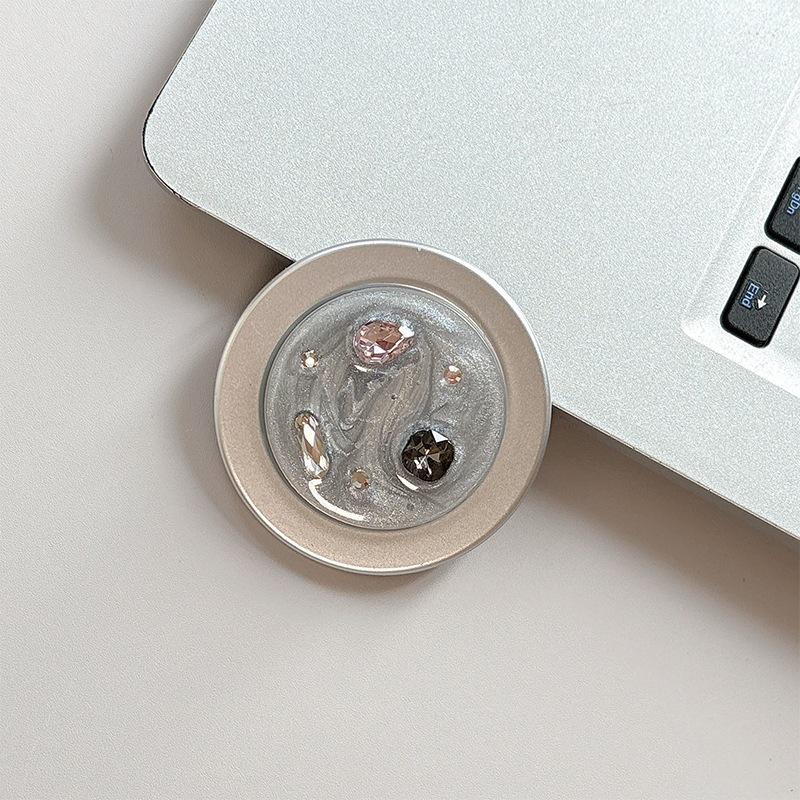 Vibrant Rhinestone & Gem Phone Grip: Magnetic, Retractable Airbag Holder and Finger Ring for Hands-Free Viewing.