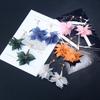 Pendientes largos con pétalos de flores llamativos para mujer, accesorio de joyería
