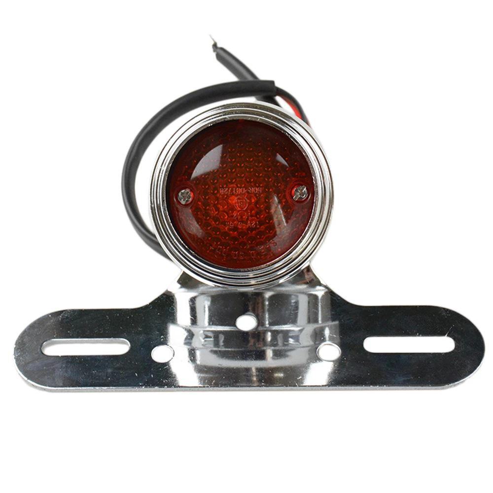 

Універсальний мотоциклетний світлодіодний задні ліхтарі з інтегрованими ретро нічними ліхтарями та стоп-ліхтарями.