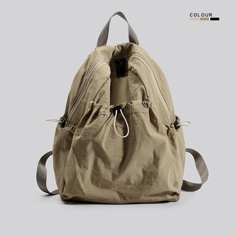 Travel lightweight men's backpack 2025 new Korean version casual waterproof backpack schoolbag female high school student