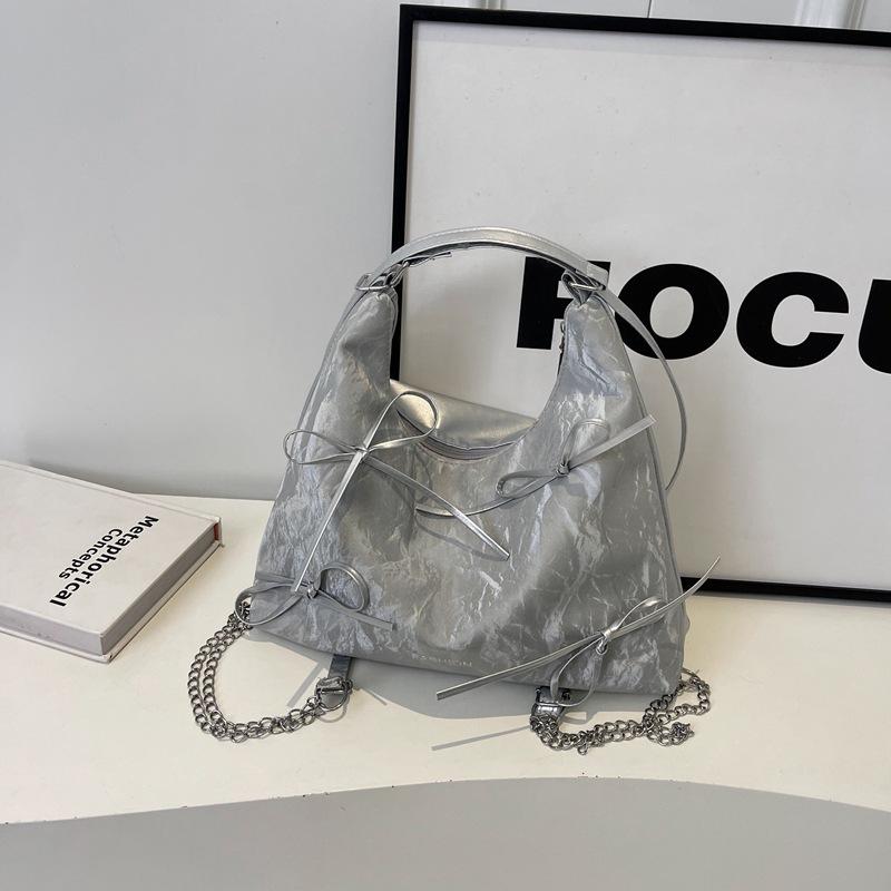 

This year s popular fashion bow shoulder bag women s niche design versatile casual bag tote bag серебряный
