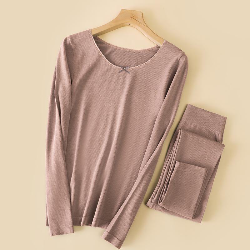 

Комплект женского термобелья из шерсти - бесшовный, легкий, теплый, с длинным рукавом, круглым вырезом и брюками для осени и зимы One Size