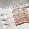 DIKALU Nine-Color Milk Tea Eyeshadow Palette: Acrylic Nude Series with Shimmer & Matte Finish.