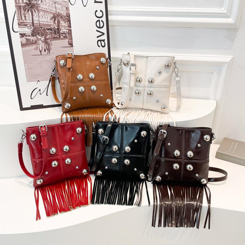 Fashionable design bucket bag Personalized Rivet Shoulder Bag Fashion Tassel Trend Crossbody Small Square Bag