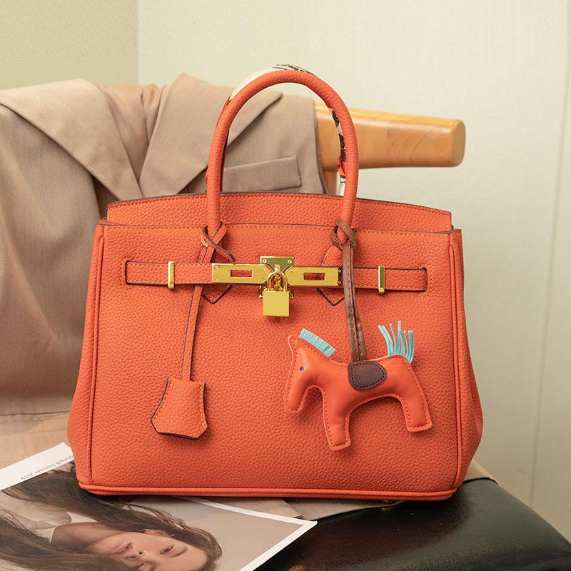 

Сумка Cross Border для женщин, новая сумка из натуральной кожи Platinum, высококачественная текстура, большая вместимость, женская сумка через плечо 25x13.5x20cm оранжевый