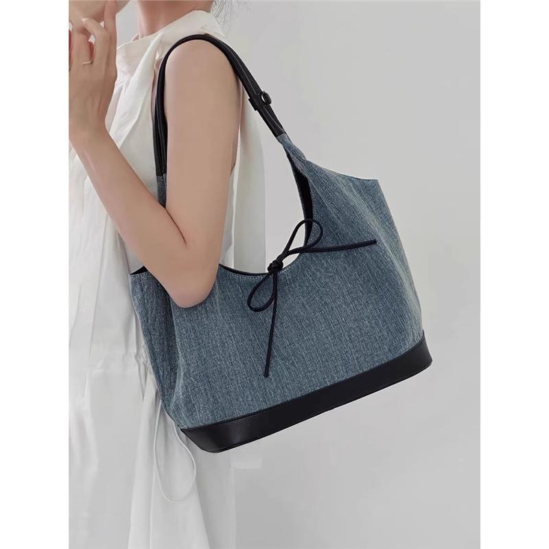 Niche bow denim canvas splicing single shoulder underarm tote bag lazy wind casual large capacity bag women