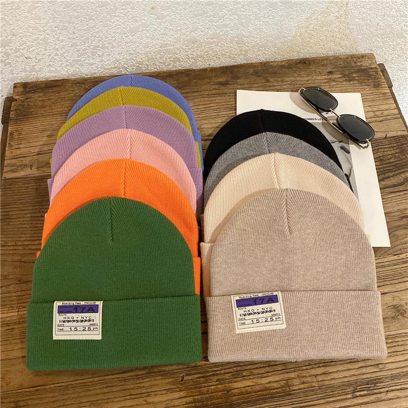Autumn and winter hat women's wool hat handmade letter labeling white bucket hat winter knitted cold hat couple tide
