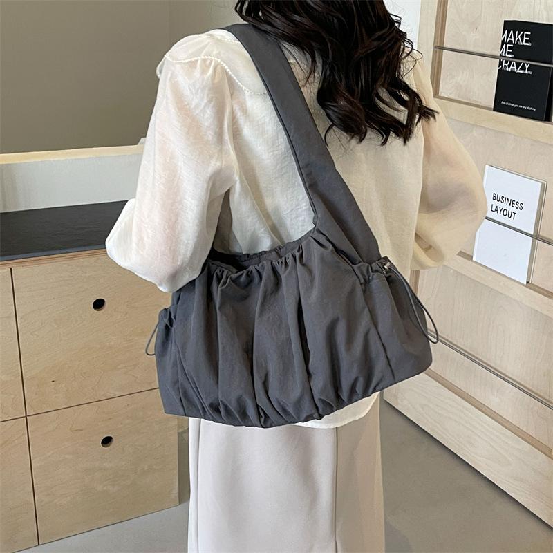 Niche Design Simple Canvas Shoulder Bag Women's 2026 Spring and Summer New Large-capacity Casual Commuter Armpit Bag