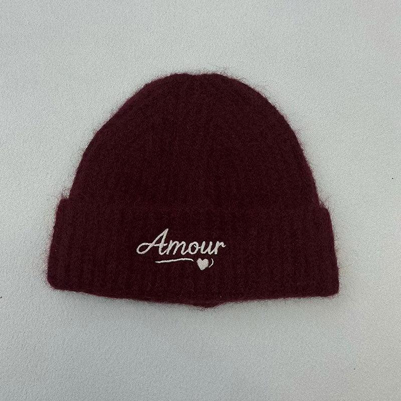 Autumn and winter original new letter embroidery knitted hat to keep warm and show the face, small ear protectors and versatile wool hat