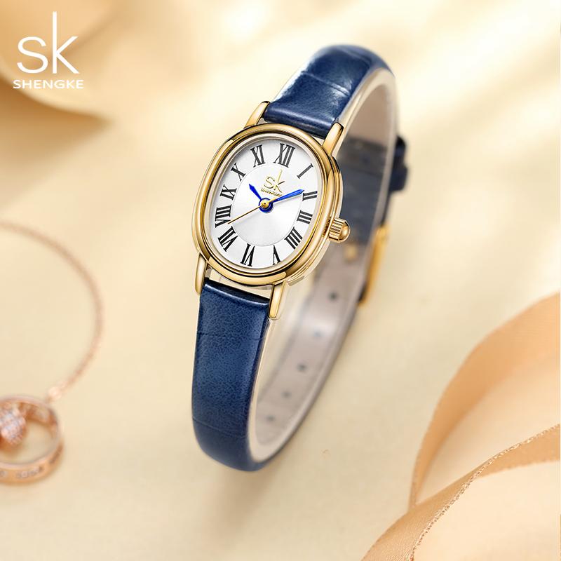 SHENGKE Set Regalo Orologio Da Donna Al Quarzo Con Cinturino In Pelle Nera – Design Minimalista + Bracciale Omaggio – Impermeabile 3 ATM